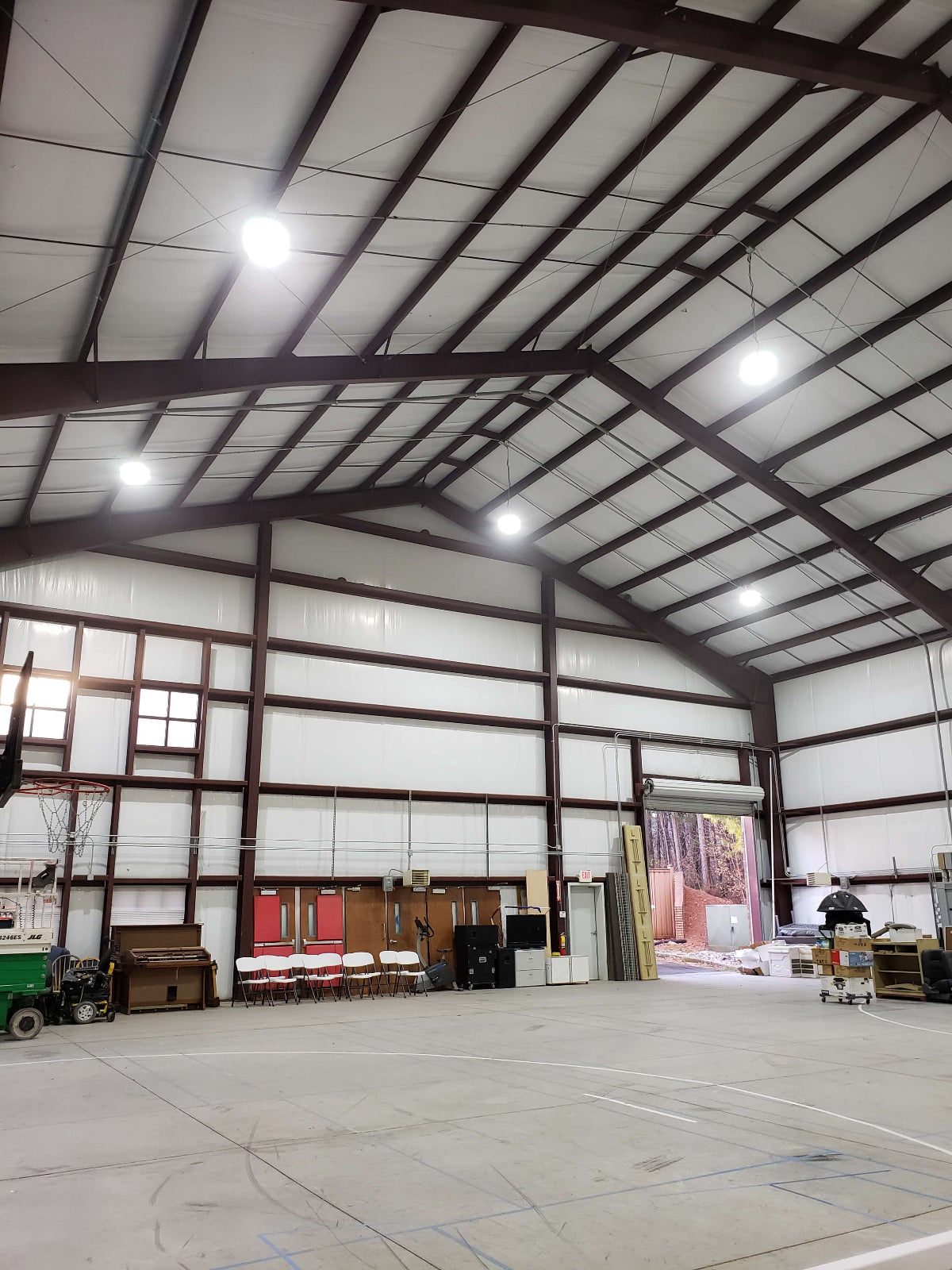 Warehouse with bright new led  high bay lighting installed